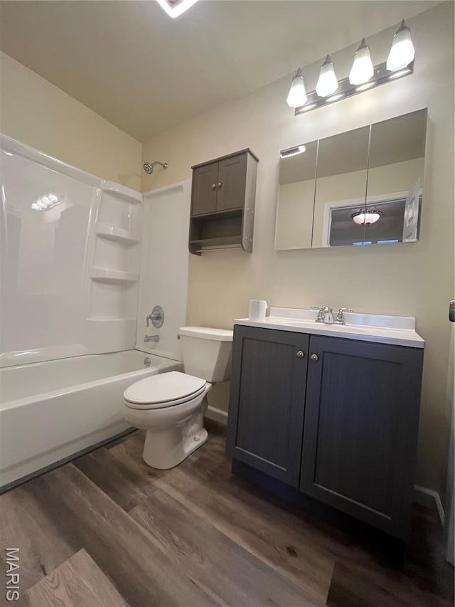 503 N Louise Ave, St James, MO 65559 - full bath with toilet, wood finished floors, shower / bath combination, and vanity
