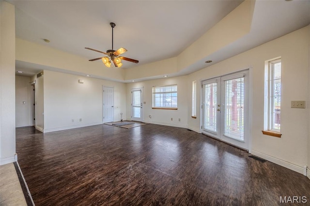 20270 Hyatt Ln, Saint Robert, MO 65584 - unfurnished living room with wood finished floors, a ceiling fan, baseboards, and french doors