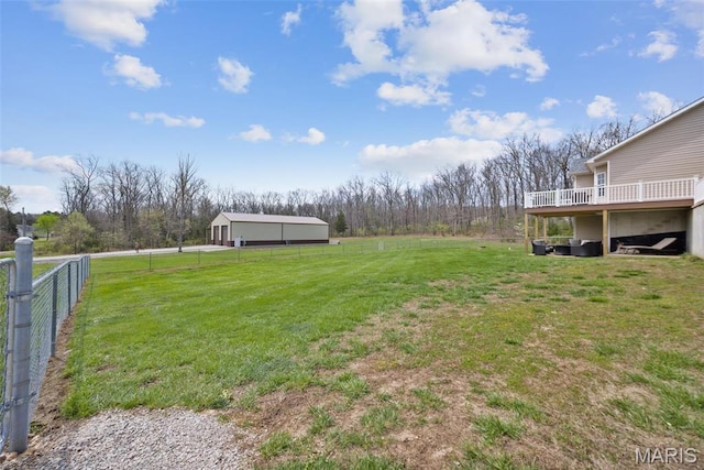 view of yard with a wooden deck