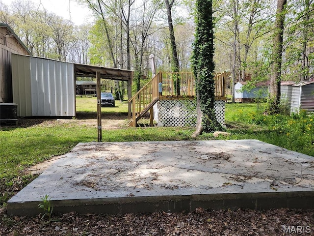 35 Marler Dr, Wappapello, MO 63966 - view of grassy yard with stairway and a carport