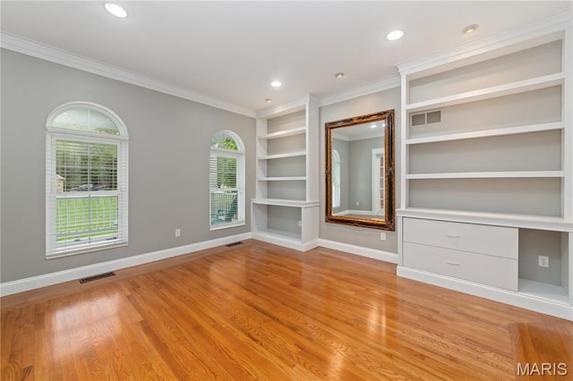809 Star Ridge Ct, Defiance, MO 63341 - empty room with ornamental molding, light wood-style flooring, built in features, and recessed lighting