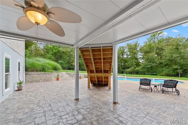 809 Star Ridge Ct, Defiance, MO 63341 - view of patio / terrace with an outdoor pool, view of scattered trees, and ceiling fan