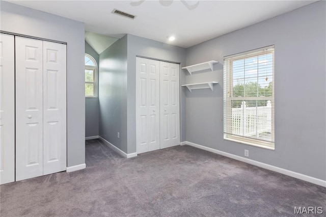 809 Star Ridge Ct, Defiance, MO 63341 - unfurnished bedroom with multiple closets and carpet flooring