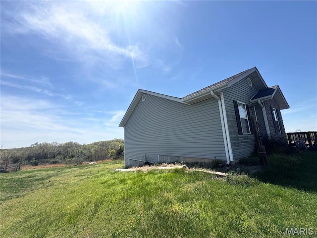18410 Charity Dr, Dixon, MO 65459 - view of side of home with a lawn