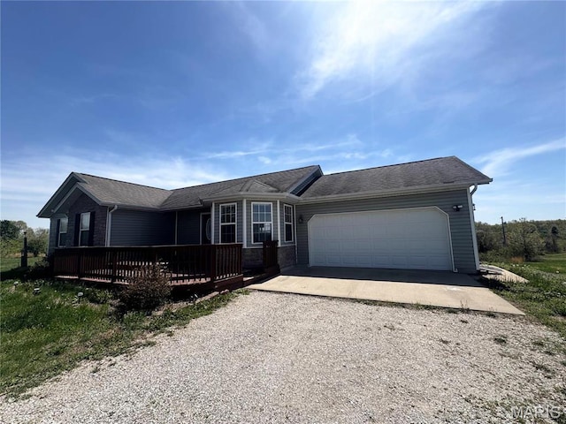 18410 Charity Dr, Dixon, MO 65459 - ranch-style house featuring dirt driveway, a garage, and a wooden deck