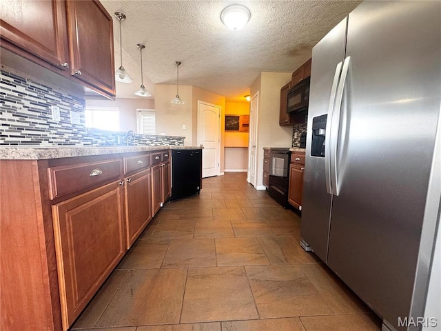 18410 Charity Dr, Dixon, MO 65459 - kitchen featuring black appliances, tasteful backsplash, light countertops, a textured ceiling, and decorative light fixtures