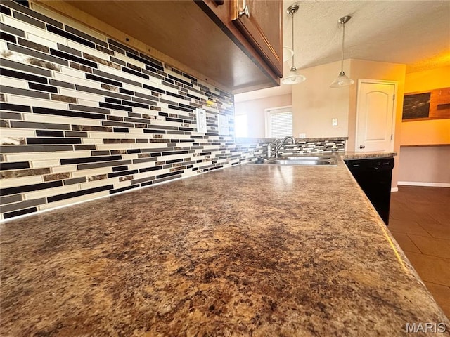 18410 Charity Dr, Dixon, MO 65459 - kitchen with a sink, backsplash, dishwasher, a peninsula, and pendant lighting