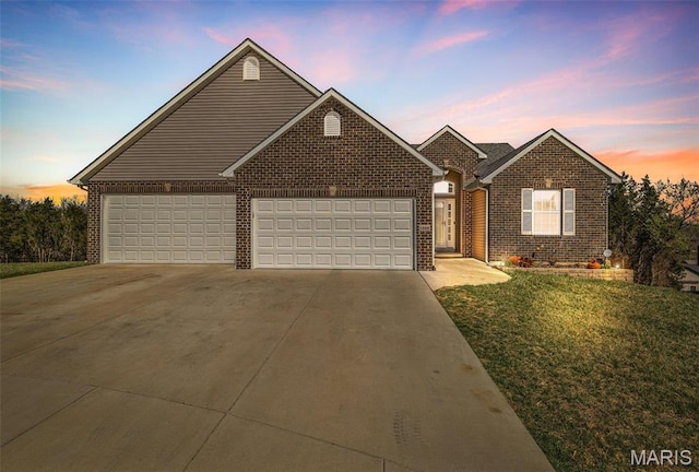1869 Sunset Rdg, Festus, MO 63028 - traditional home with concrete driveway, brick siding, a garage, and a lawn