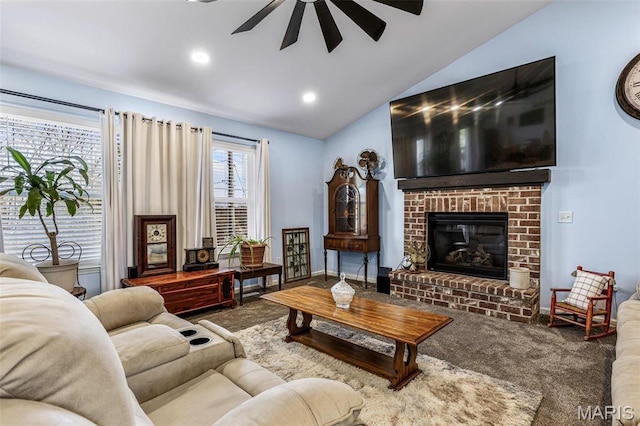 1869 Sunset Rdg, Festus, MO 63028 - carpeted living area featuring lofted ceiling, ceiling fan, a fireplace, and baseboards
