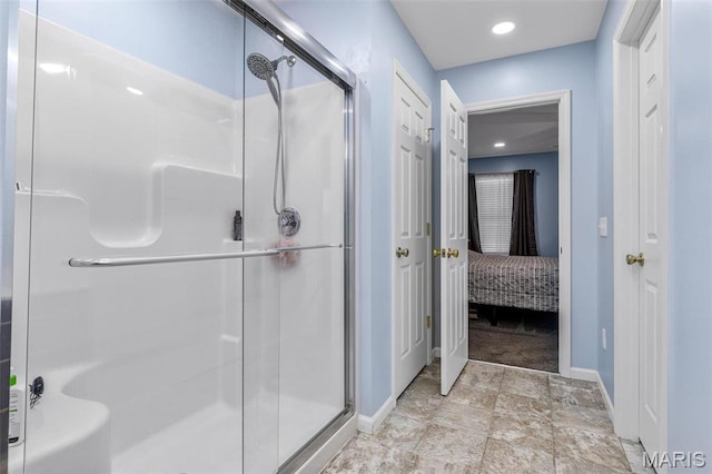 1869 Sunset Rdg, Festus, MO 63028 - ensuite bathroom featuring a stall shower, baseboards, and recessed lighting