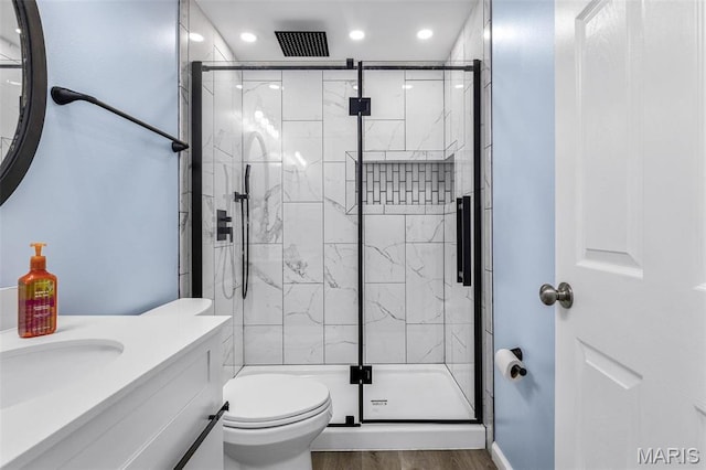 1869 Sunset Rdg, Festus, MO 63028 - full bath featuring a stall shower, recessed lighting, toilet, wood finished floors, and vanity