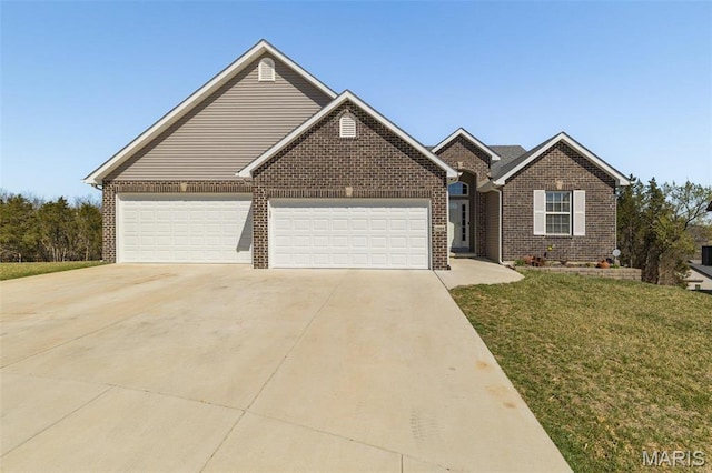 1869 Sunset Rdg, Festus, MO 63028 - view of front of house featuring concrete driveway, brick siding, an attached garage, and a front yard
