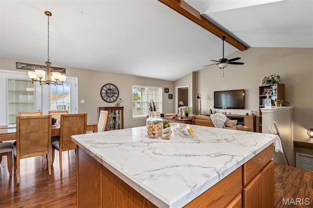 790 Isabella Ct, Farmington, MO 63640 - kitchen featuring a chandelier, dark wood-style floors, a ceiling fan, pendant lighting, and brown cabinetry