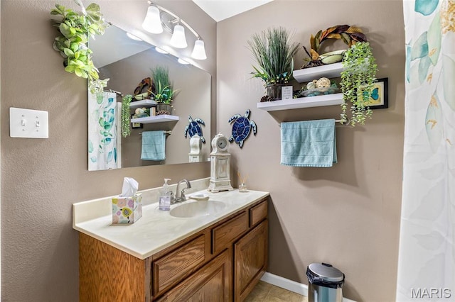 790 Isabella Ct, Farmington, MO 63640 - full bath featuring vanity, tile patterned flooring, and baseboards