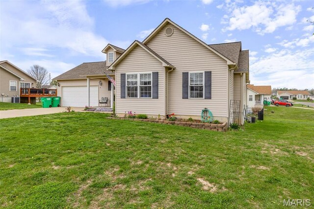 790 Isabella Ct, Farmington, MO 63640 - view of front facade with driveway, a garage, a front lawn, and cooling unit