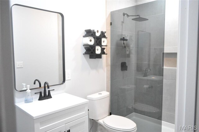 869 Destiny Dr, Villa Ridge, MO 63089 - full bathroom with toilet, vanity, and a tile shower