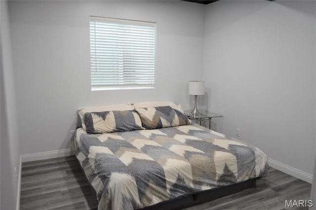869 Destiny Dr, Villa Ridge, MO 63089 - bedroom featuring baseboards and wood finished floors