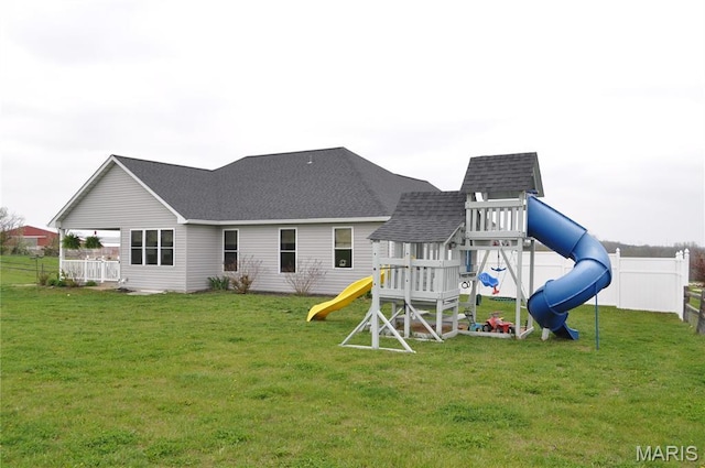 869 Destiny Dr, Villa Ridge, MO 63089 - back of house with a playground and a shingled roof