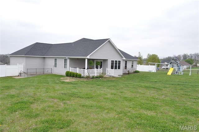 869 Destiny Dr, Villa Ridge, MO 63089 - back of property featuring a playground and a shingled roof