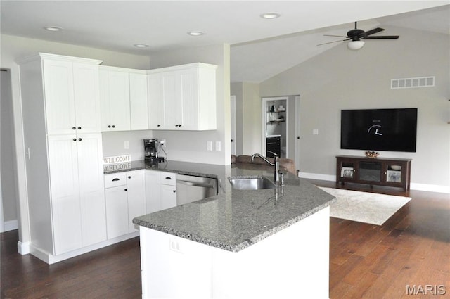 869 Destiny Dr, Villa Ridge, MO 63089 - kitchen with a sink, a peninsula, a ceiling fan, stainless steel dishwasher, and baseboards
