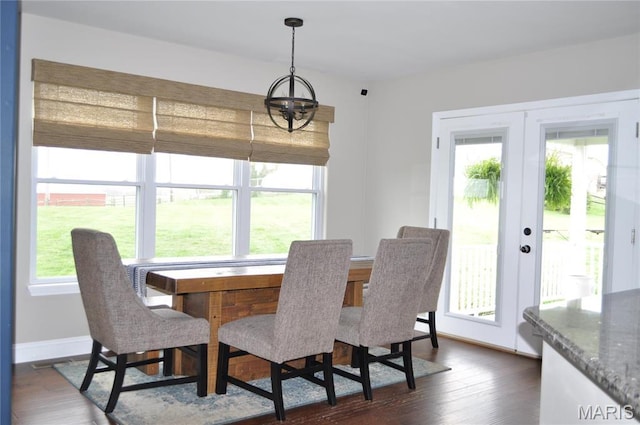 869 Destiny Dr, Villa Ridge, MO 63089 - dining space with dark wood-type flooring, french doors, and baseboards