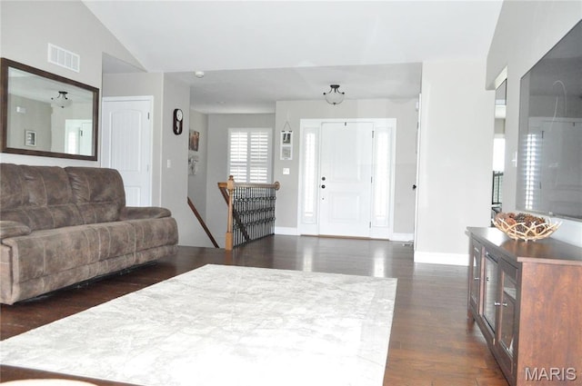 869 Destiny Dr, Villa Ridge, MO 63089 - entryway featuring dark wood-style flooring, baseboards, and vaulted ceiling