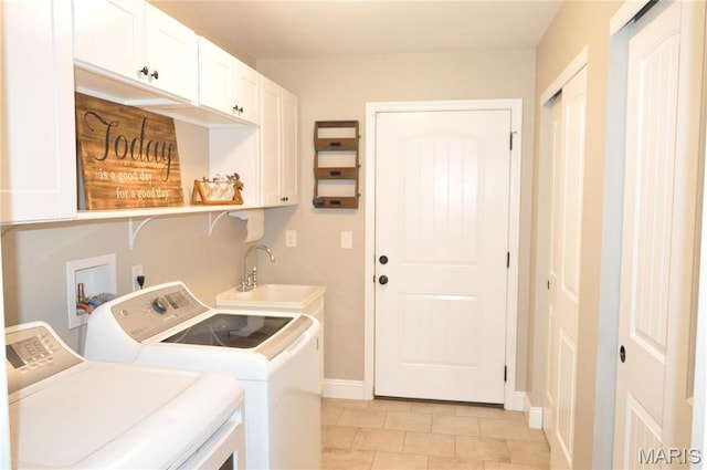 869 Destiny Dr, Villa Ridge, MO 63089 - washroom featuring washer and dryer, cabinet space, baseboards, and light tile patterned floors