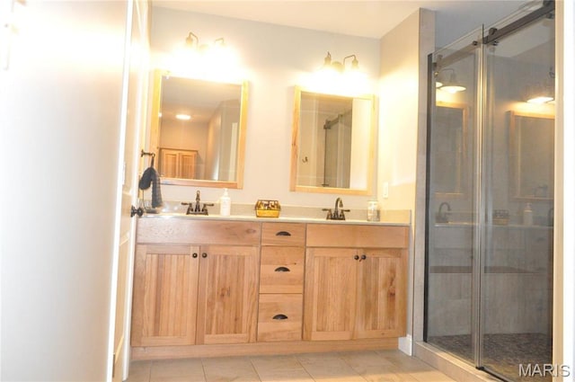869 Destiny Dr, Villa Ridge, MO 63089 - full bath featuring double vanity, a shower stall, and tile patterned floors