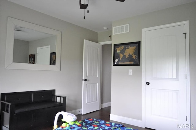 869 Destiny Dr, Villa Ridge, MO 63089 - bedroom featuring baseboards, ceiling fan, and dark wood-style flooring
