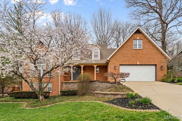 1029 Stonybrook Dr, Ofallon, IL 62269 - view of front of house with brick siding, concrete driveway, a garage, and a front yard