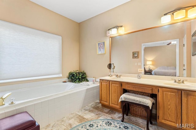 1029 Stonybrook Dr, Ofallon, IL 62269 - bathroom featuring ensuite bath, a bath, and double vanity
