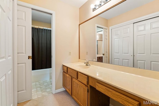 1029 Stonybrook Dr, Ofallon, IL 62269 - full bath featuring vanity, shower / tub combo with curtain, and baseboards