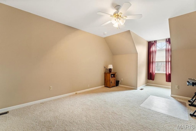 1029 Stonybrook Dr, Ofallon, IL 62269 - additional living space with carpet flooring, a ceiling fan, baseboards, and lofted ceiling