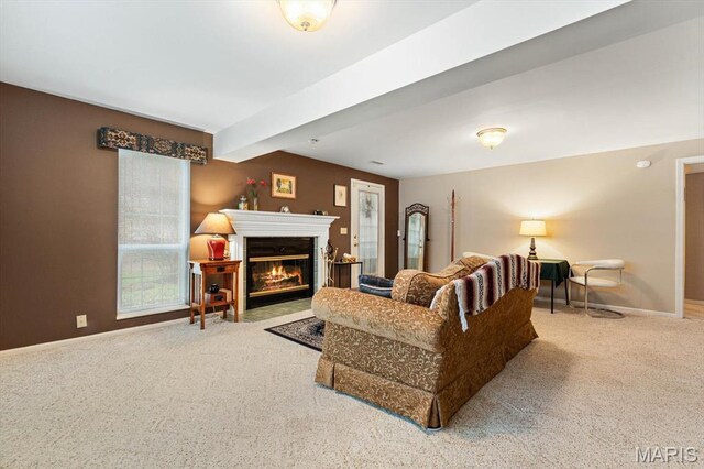 1029 Stonybrook Dr, Ofallon, IL 62269 - living room with carpet floors, baseboards, and a fireplace with flush hearth