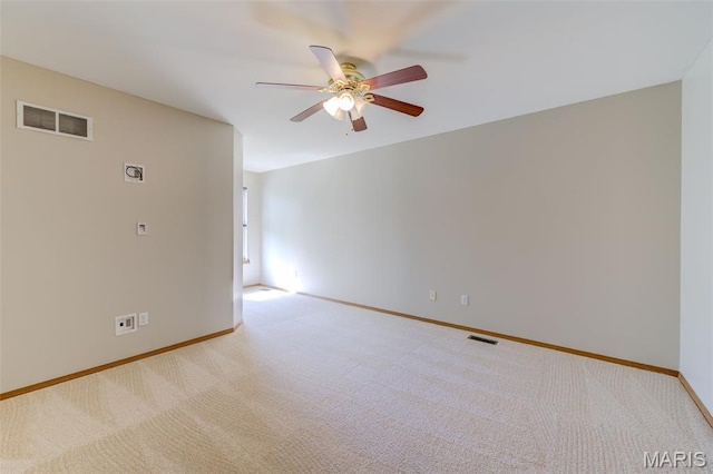 7 Park City Ct, Ofallon, MO 63368 - spare room featuring ceiling fan, baseboards, and carpet