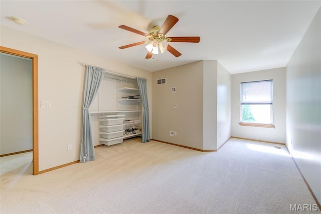 7 Park City Ct, Ofallon, MO 63368 - unfurnished bedroom with light colored carpet, baseboards, and ceiling fan