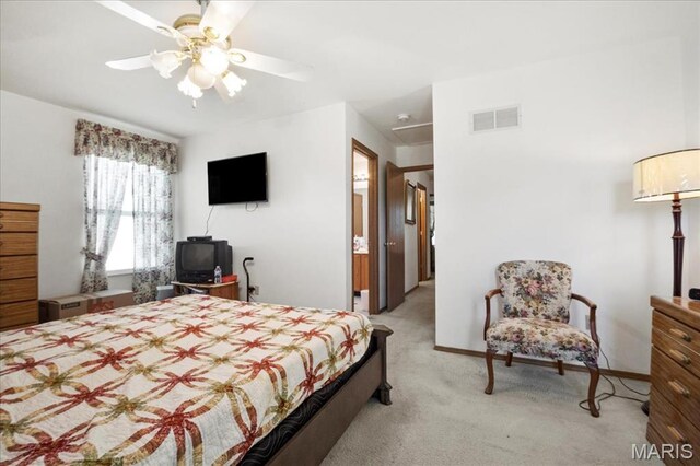 13011 Mystic Bend Ln, Black Jack, MO 63033 - bedroom with light carpet, baseboards, and a ceiling fan