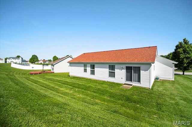 13011 Mystic Bend Ln, Black Jack, MO 63033 - back of house with a lawn