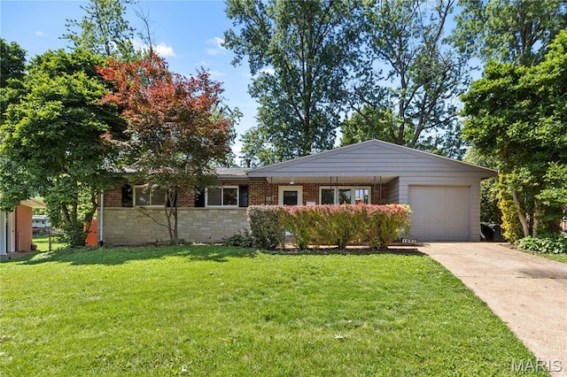 1630 Bobbinray Ave, Florissant, MO 63031 - single story home with brick siding, a front yard, an attached garage, and driveway