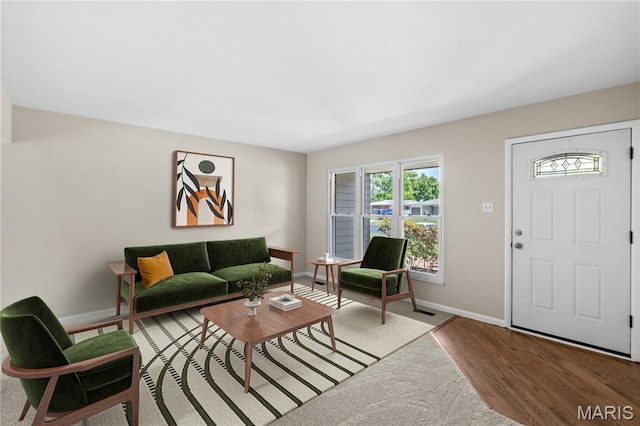 1630 Bobbinray Ave, Florissant, MO 63031 - living room with baseboards and wood finished floors
