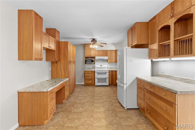 1630 Bobbinray Ave, Florissant, MO 63031 - kitchen featuring white appliances, a ceiling fan, tasteful backsplash, under cabinet range hood, and baseboards