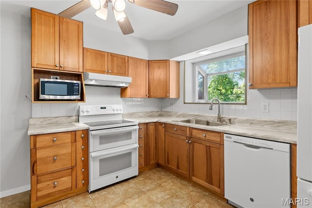 1630 Bobbinray Ave, Florissant, MO 63031 - kitchen featuring white appliances, under cabinet range hood, a sink, tasteful backsplash, and ceiling fan
