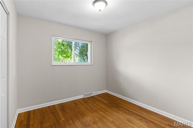 1630 Bobbinray Ave, Florissant, MO 63031 - empty room featuring baseboards and wood finished floors