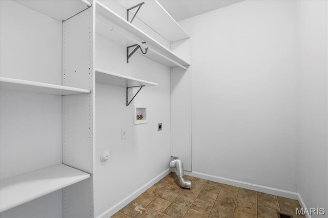 laundry room with washer hookup, electric dryer hookup, and baseboards