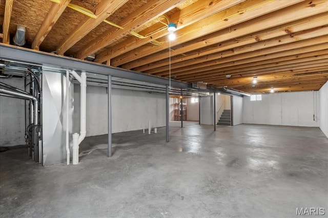 unfinished basement with stairs