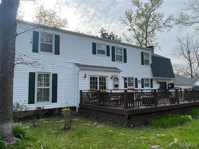 1843 Manor Hill Rd, Saint Louis, MO 63131 - back of property featuring a deck and a shingled roof