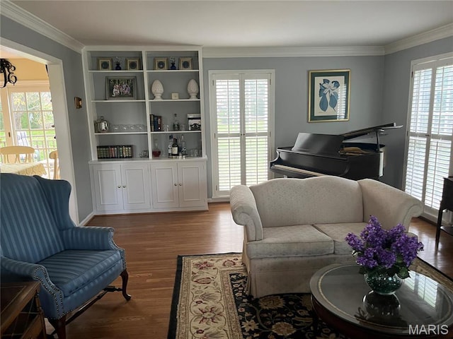 1843 Manor Hill Rd, Saint Louis, MO 63131 - living area with wood finished floors, ornamental molding, and healthy amount of natural light