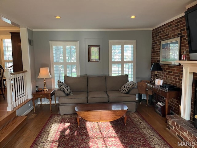1843 Manor Hill Rd, Saint Louis, MO 63131 - living area with wood-type flooring, crown molding, a fireplace, and recessed lighting