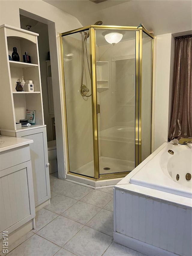 1843 Manor Hill Rd, Saint Louis, MO 63131 - full bath featuring a stall shower, tile patterned floors, a tub with jets, toilet, and vanity