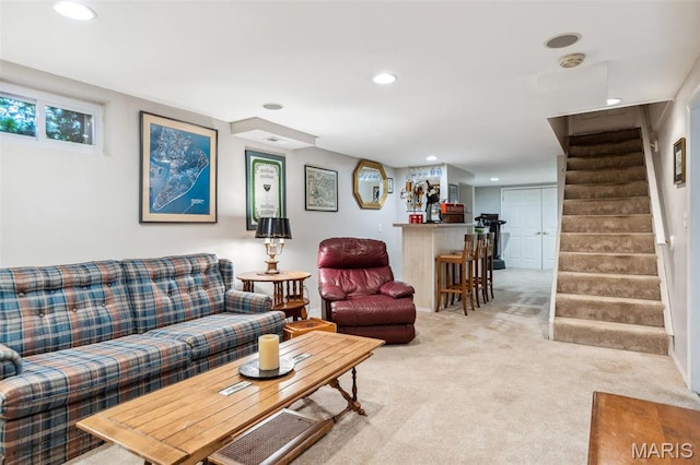 1843 Manor Hill Rd, Saint Louis, MO 63131 - living room featuring stairs, recessed lighting, and light carpet